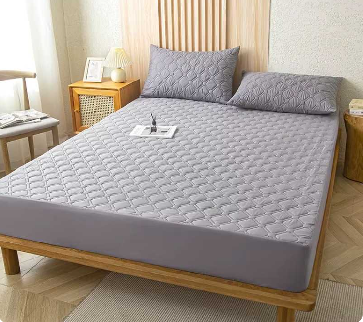 Protector de colchon gris